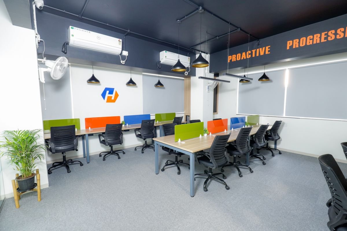 Open-plan office with workstations, managed office built by Workin Space